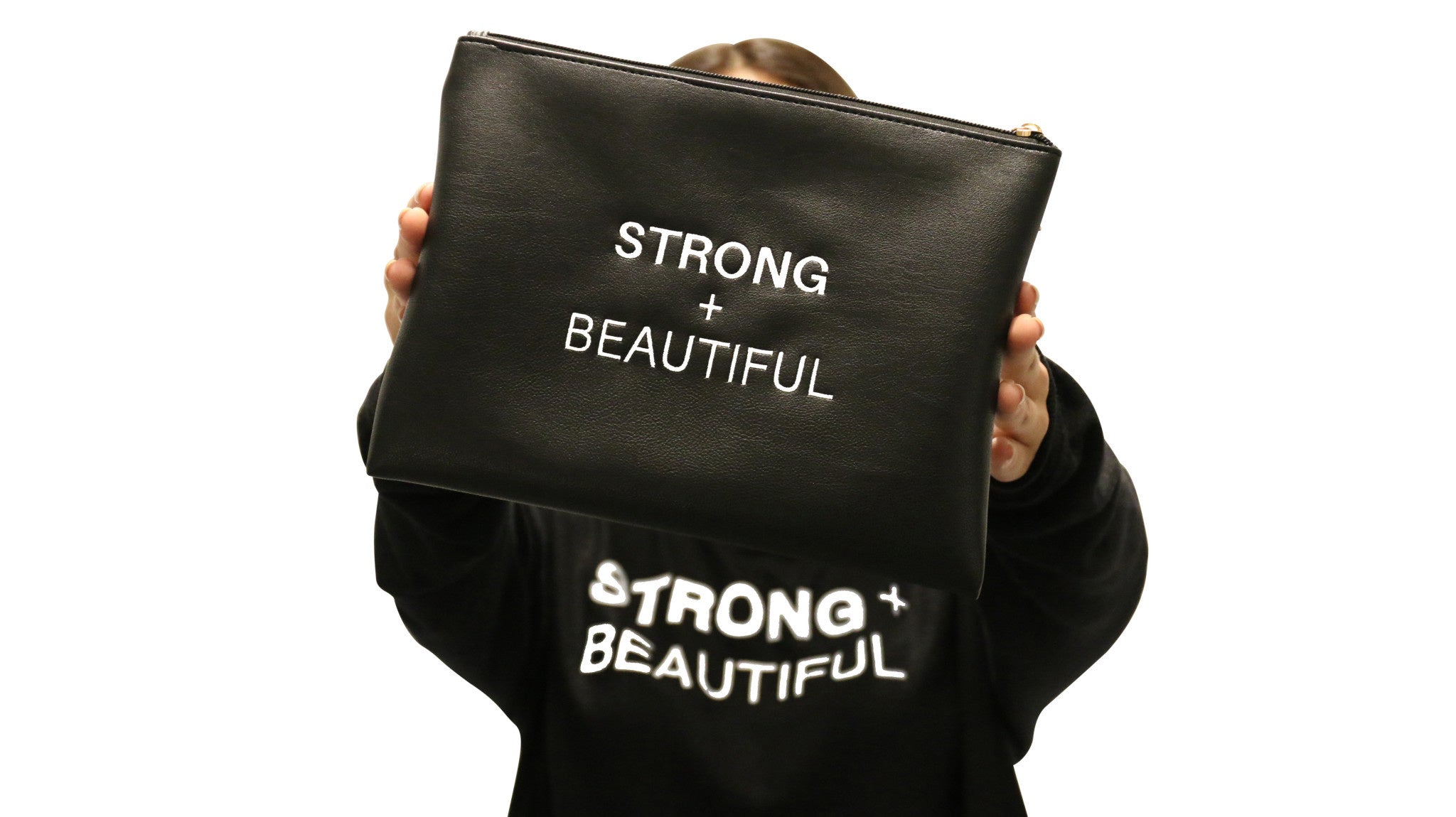 I Am More Scarsdale Strong + Beautiful leather bag with person holding bag